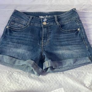 jean shorts with sparkly stones on  the back pockets